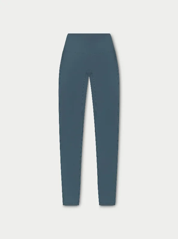 Women's Velvet Tight Trousers in Burgundy for a Luxurious and Elegant AppearanceSCULPTING STRETCH EMBLEM LEGGINGS - PETROL BLUE