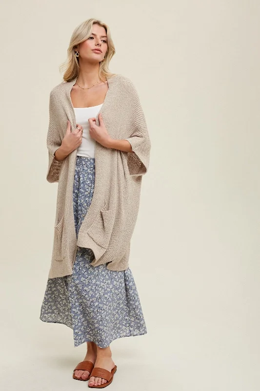 oversized women cardigan for a trendy and cozy lookCream Drop Shoulder Side Pocket 3/4 Sleeve Cardigan