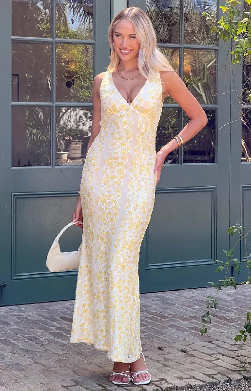 Maxi dresses with pocket details for added functionalityFarida Yellow Lace Maxi Dress