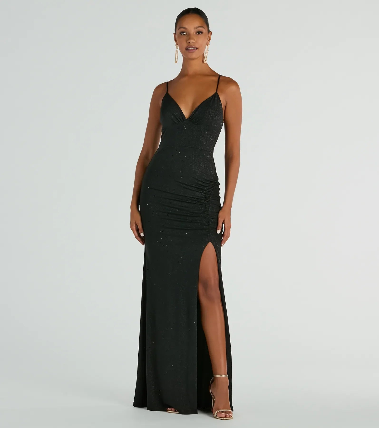 Metallic maxi dresses for a glamorous New Year's Eve partyMelinda V-Neck Slit Mermaid Glitter Formal Dress