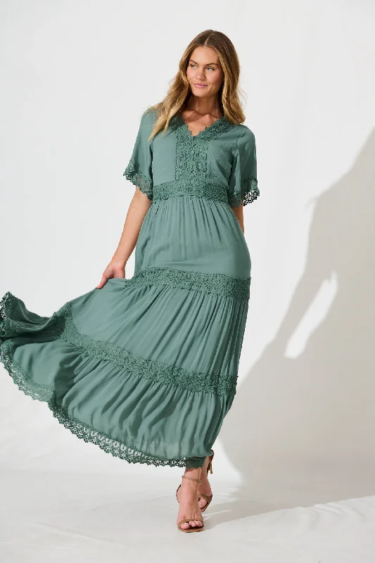 Maxi dresses with a criss - cross back for a flirty and unique detailMona Maxi Dress In Dark Sage Green